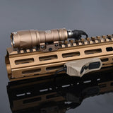 Tactical flashlight mounted on a rifle barrel with a dark gray background